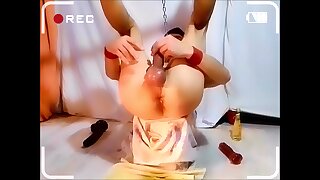 naked uncut, unmasked slave tied up spread legs, stretch cunt till bottle fits, suddenly pee