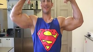 Jakub Stefano Flexing In Superman Tank Top