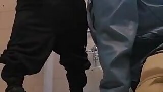 Short macho man facefucks big guy in Public bathroom and they both cum.