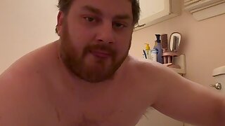 Chubby faggot strips down, shows nub cock, licks toilet