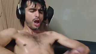 Cute cam guy self sucks and blasts a big load of cum on his own face and in his mouth