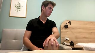 He gets naked and jerks off until cumming his load